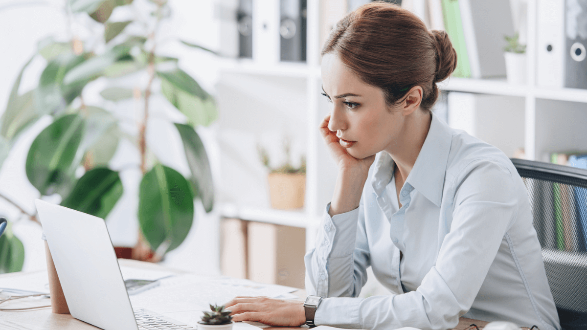 Businesswoman working with laptop at a modern office