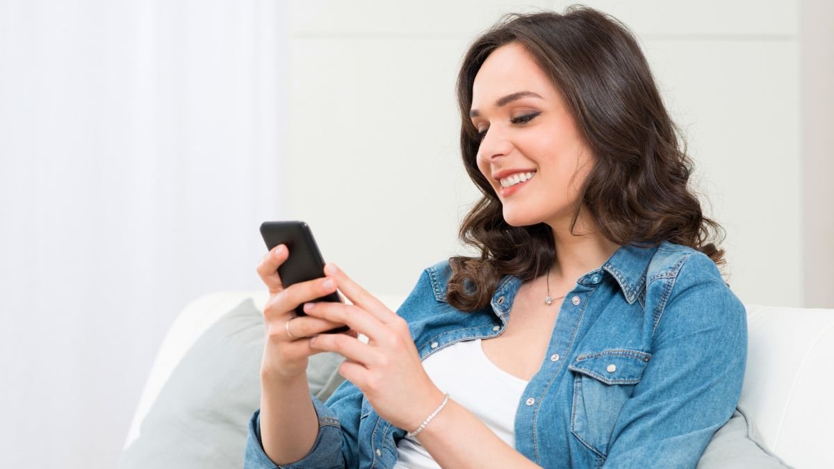 Happy Woman Busy With Her Phone MSN