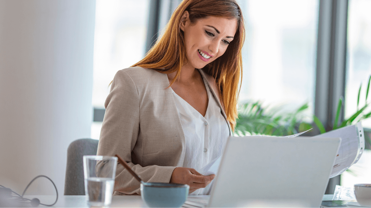 Woman in office working on laptop