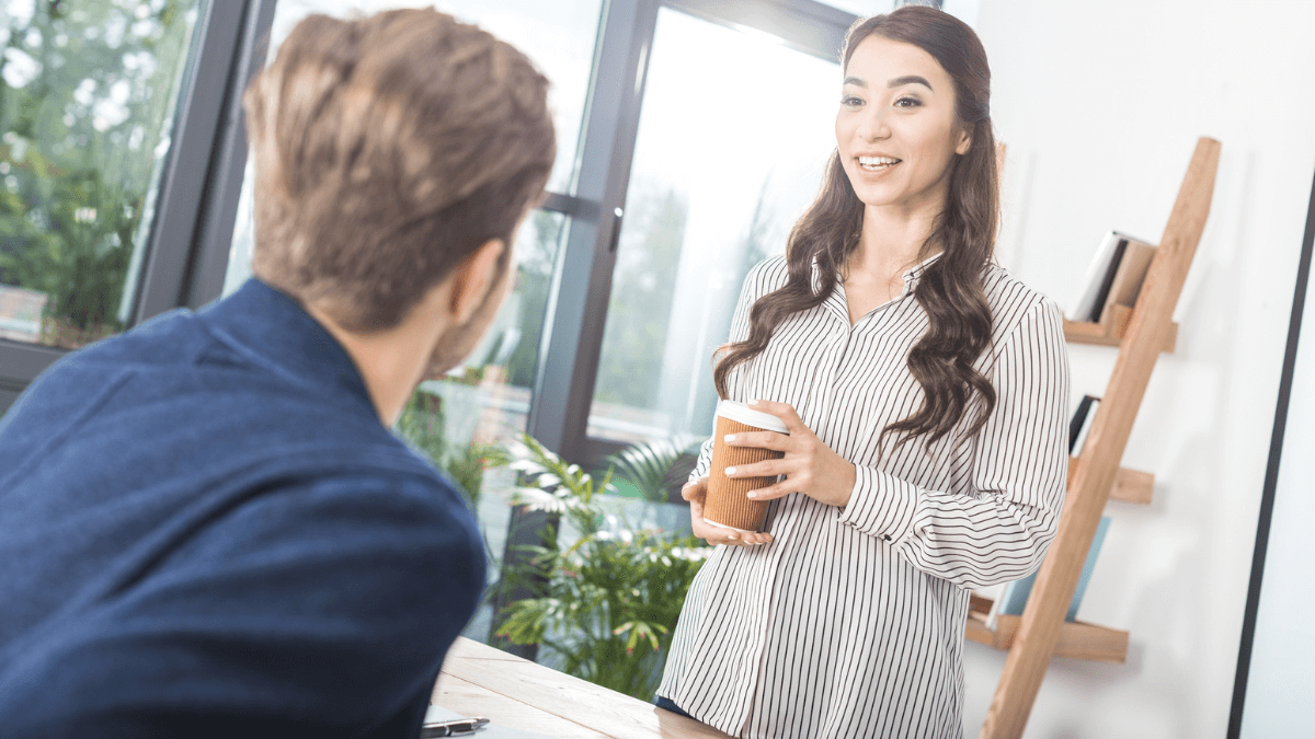 Businesswoman discussing with a colleague